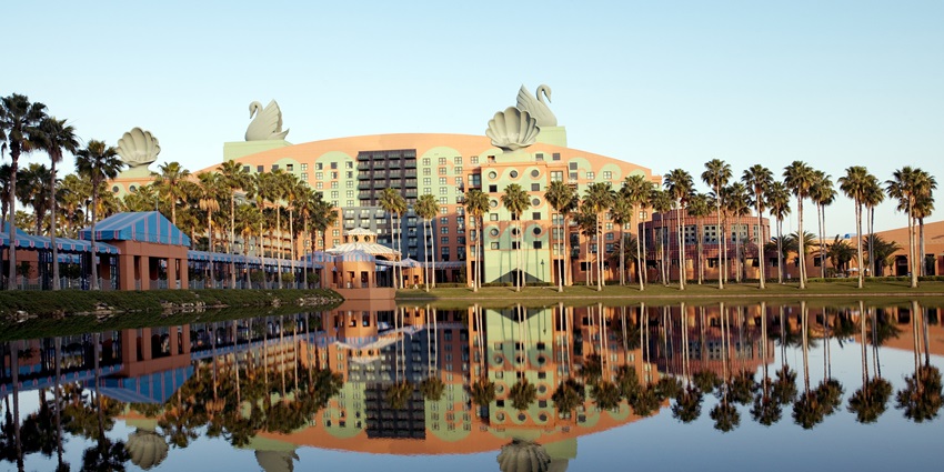 Exterior view of the Swan Hotel at Walt Disney World, featuring its iconic swan statues.