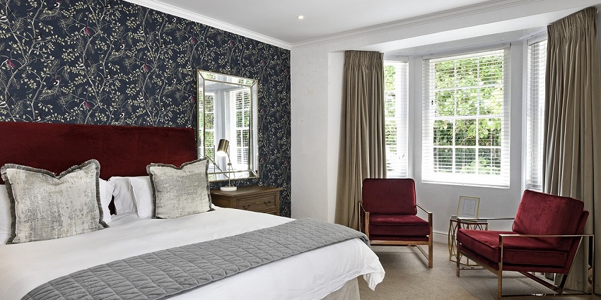 A beautiful luxury hotel room offering a comfortable stay.