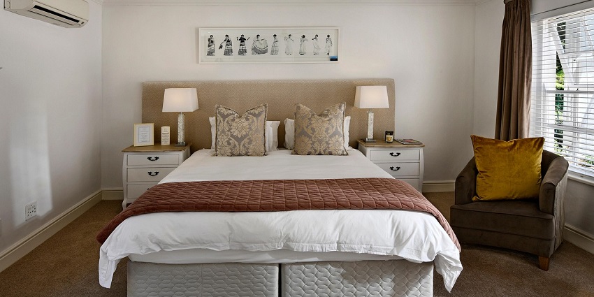 A comfortable hotel room in the city offering stunning ocean views and modern facilities.