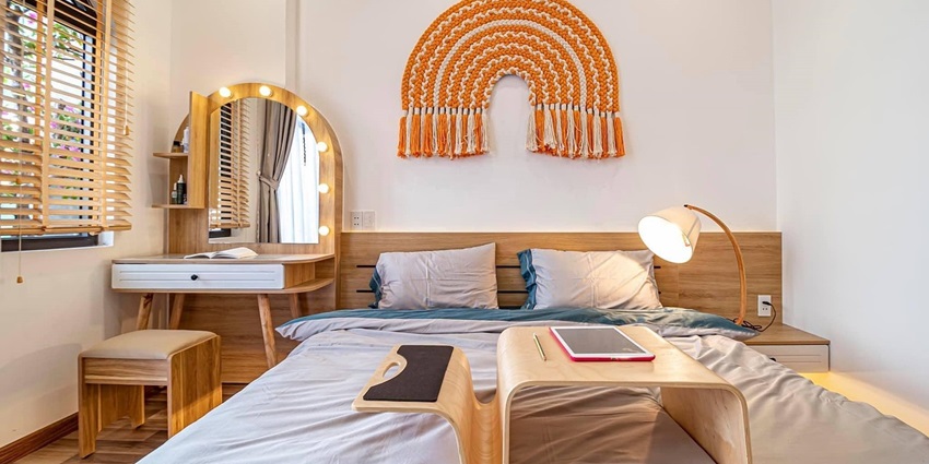 Image showing a bedroom with a bed, nightstands, and decorative elements in the interior.