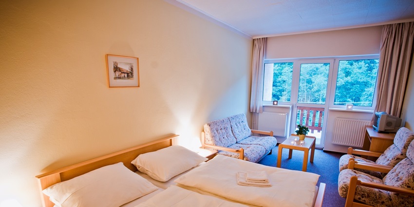 A scenic view of a hotel room similar to one in Dambulla with modern furniture.