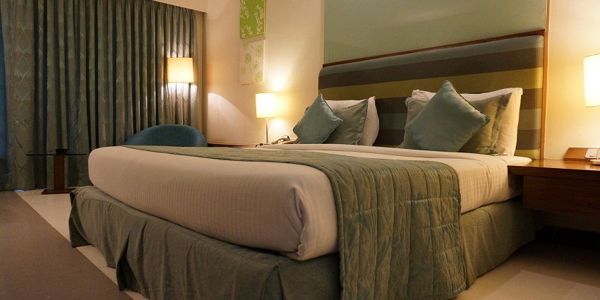 An image of a luxurious resort near Hoi An, surrounded by lush greenery and water views.