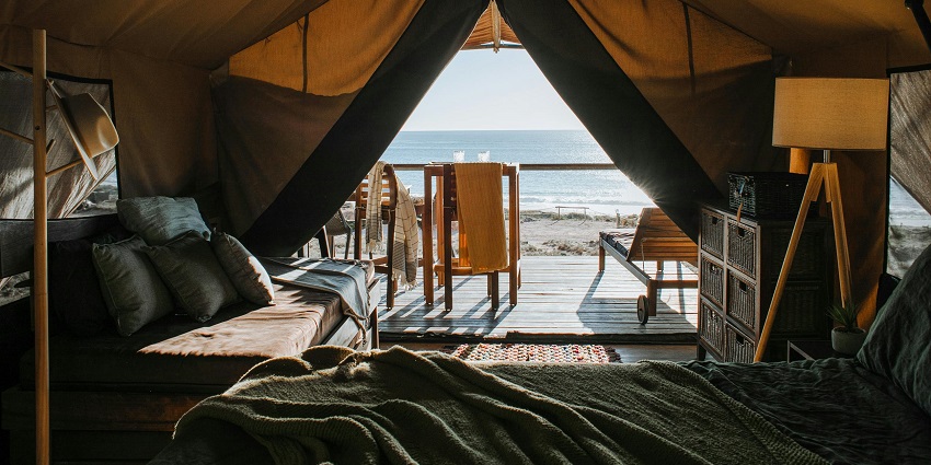 An image of a modern hotel room with panoramic views of Antalya’s coastline.