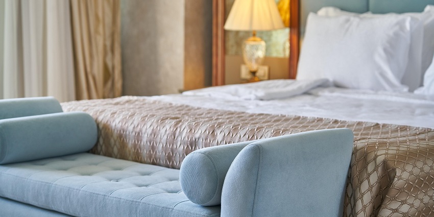 An image resembling a comfortable hotel room near Shegaon water park.