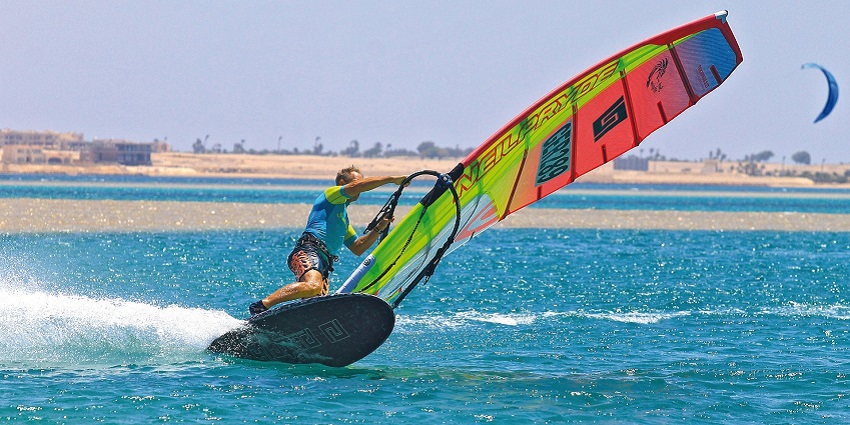 An image showing windsurfing on the sea, representing top water sports in Konkan.