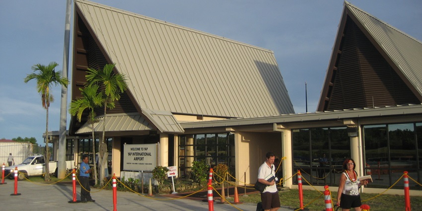 Triangular, hut-shaped terminal building of the Yap International Airport in Micronesia.
