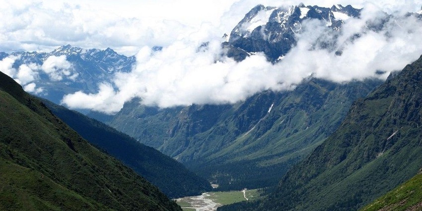 Yumthang valley with a small river, one of the sites near Green lake trek in Sikkim