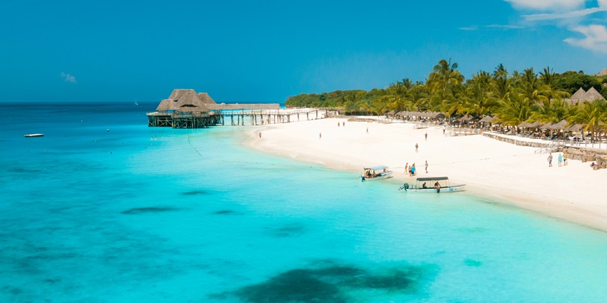 Discover Zanzibar’s white-sand beaches, spice markets, and historic Stone Town.