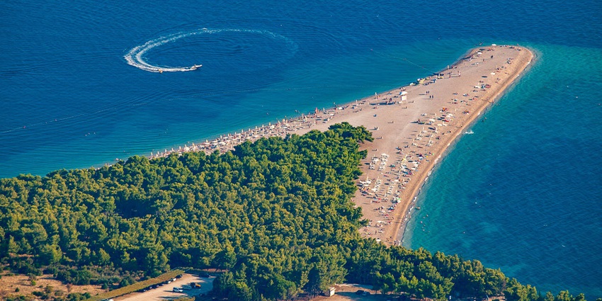 Beaches in Europe are known for unique golden sandbars shifting with tides, perfect for windsurfing and relaxation