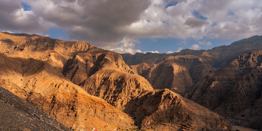 Explore the dramatic landscapes and rich biodiversity of the Hajar Mountains