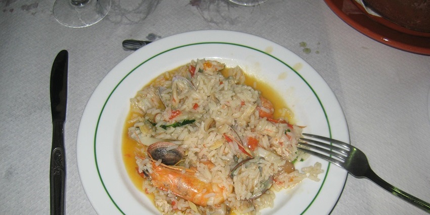 An image of Arroz de Marisco, a seafood rice dish among the best food in Portugal.