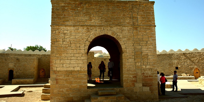 The mystical Ateshgah Fire Temple, showcasing ancient fire rituals and stone architecture.