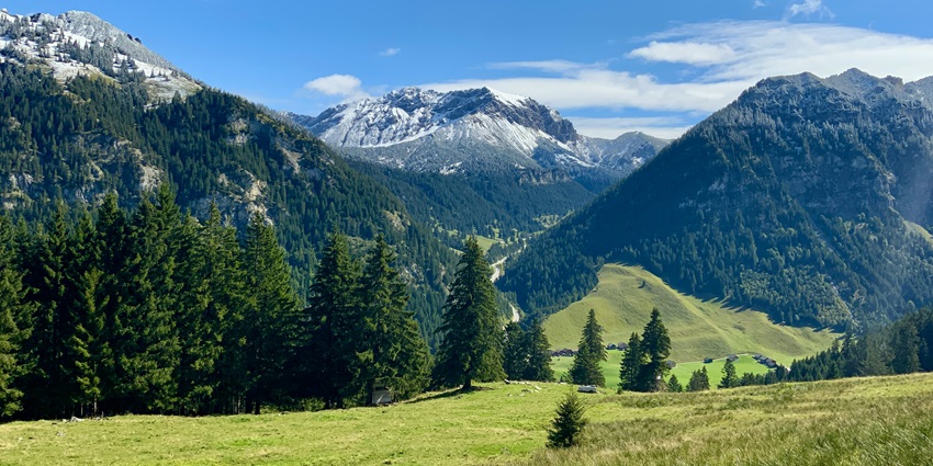 A breathtaking view of Aussichtspunkt Känzile featuring lush greenery and more.