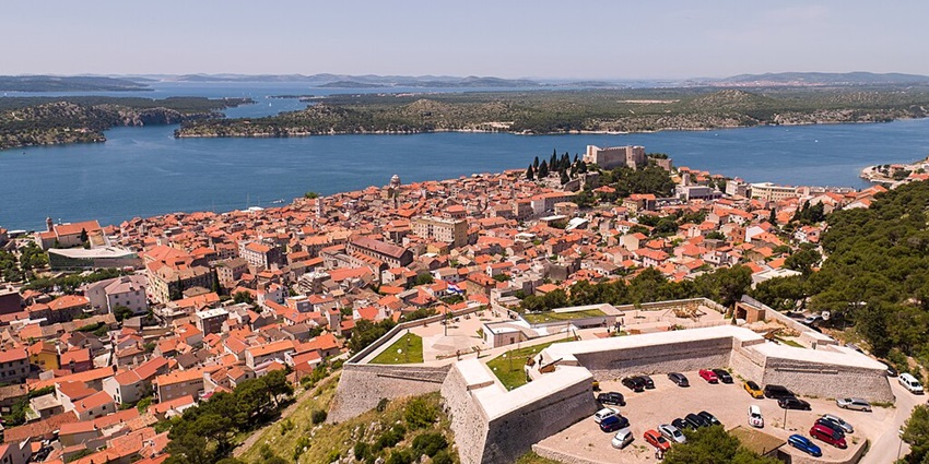 An image showing Barone Fortress in Sibenik, featuring its historic walls and elevated view.