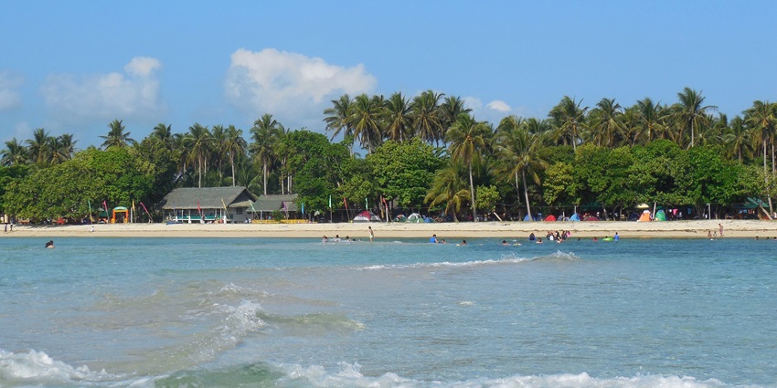 Image of Villa Cleofas Beach Resort on Cagbalete Island, with sandbar and clear waters.