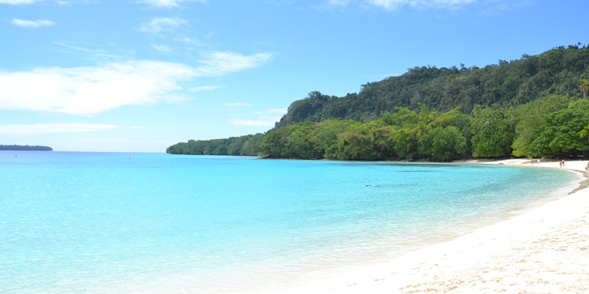 The flute-like champagne beach in Vanuatu with its clear blue water and white sands.