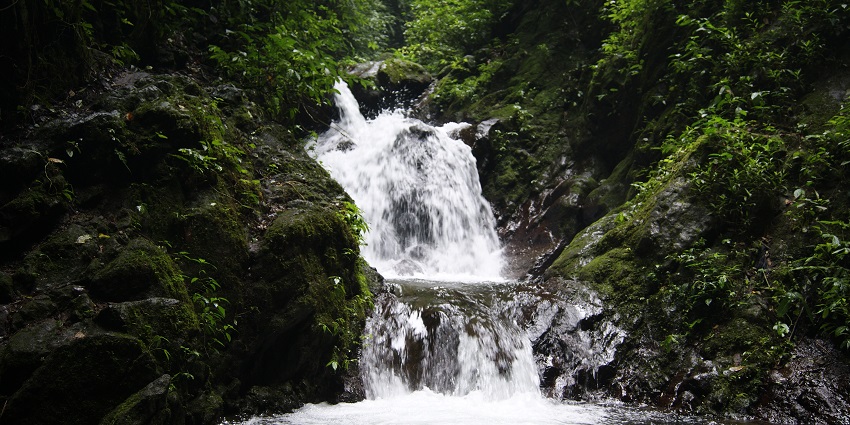 Hike to The Curug Lawe Waterfall, a hidden gem with lush natural beauty.