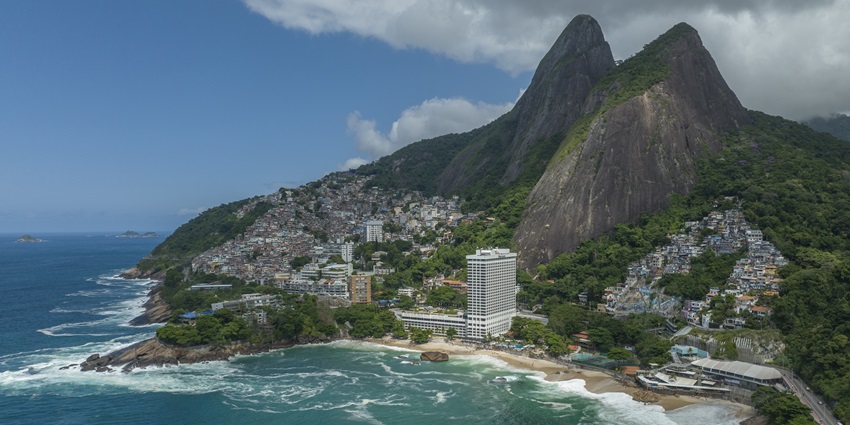 Enjoy the view of the Dois Irmaos Mountains, one of the things to do on Ipanema Beach.