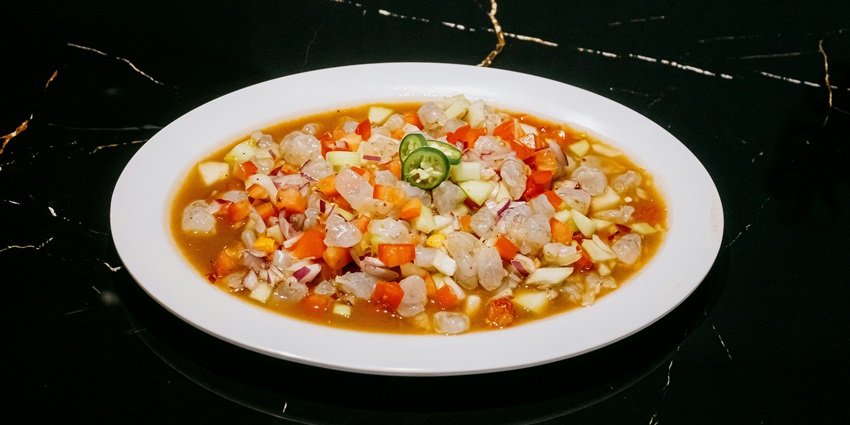 Sopa de Caracol, served hot with lime, is one of the things to do in Copan Ruinas.