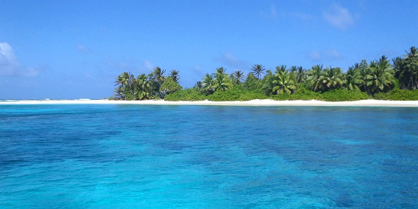 Dive Kalalin Pass to encounter vibrant coral reefs, sea life, and strong ocean currents.