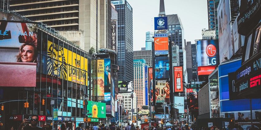 Times Square at night- a must-see highlight among the top things to do in Manhattan