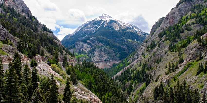 Panoramic image of the red mountains pass exploring it is one of the idyllic things to do in San Juan mountains