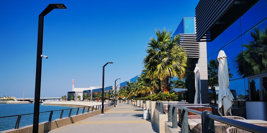 Scenic waterfront mall in Bahrain with shops, dining, and sea views for a relaxing stroll.