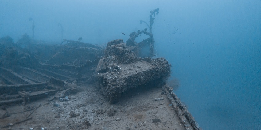 An underwater view of a Type 95 Ha-Go tank on the San Francisco Maru shipwreck, a top dive site