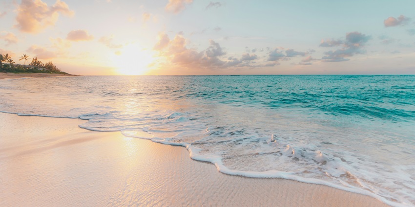 One of the best places to visit in Barbuda is this tranquil beach with turquoise waters and amazing sunsets