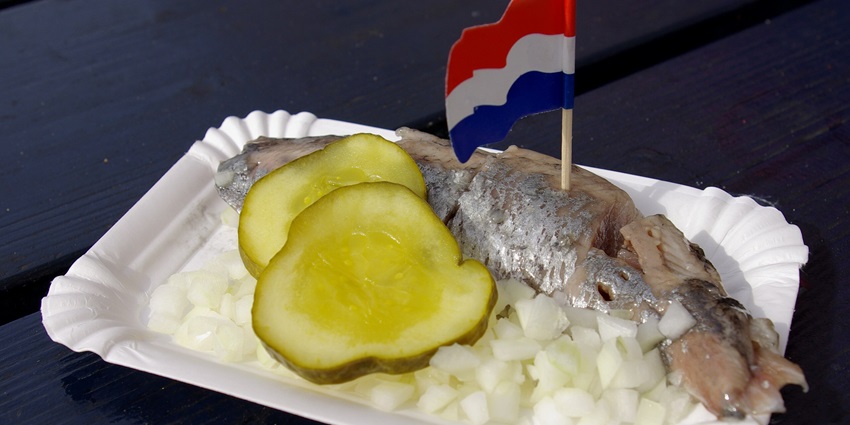 An image of Hollandse Nieuwe Haring, a traditional Dutch food in Netherlands.