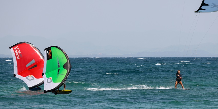 View of a woman indulging into thrilling island sports, one of the adventurous experience.