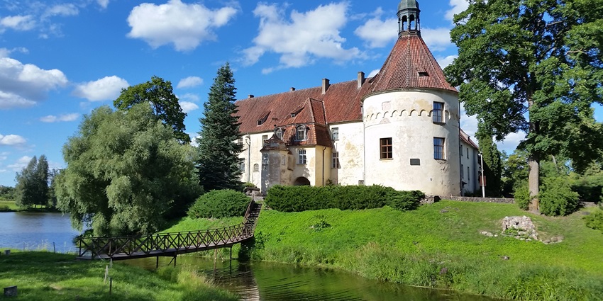 A serene view of the Jaunpils Castle, one of the serene places to visit near Riga.