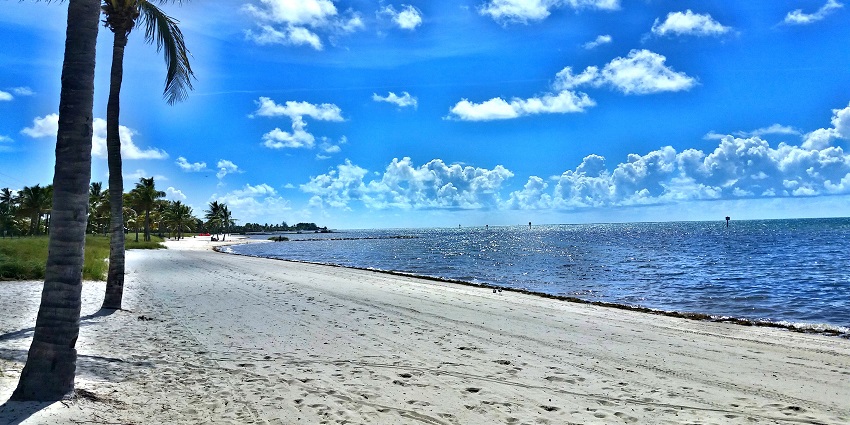 A tropical island getaway in Florida with coral reefs, pastel-hued houses, and stunning sunsets.