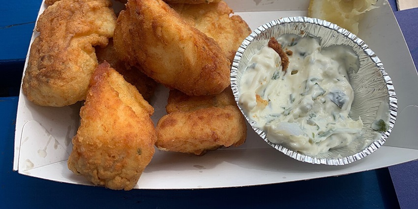 An image of a Kibbeling fish dish, a tourist favourite among the famous food in Netherlands.