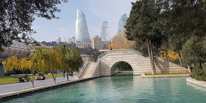 Little Venice canals softly glowing under night lights, places to visit Baku at night