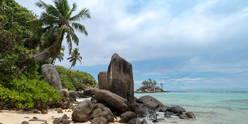 Visit Beach Anse Royale on the island Mahe, Seychelles, among the places to visit near South Africa.