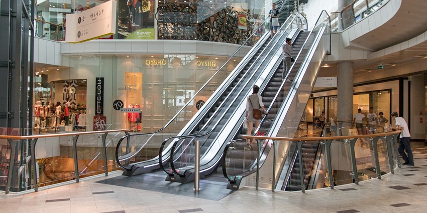 An image of a mall resembling Manor Geneva, a well-known shopping centre in Switzerland.