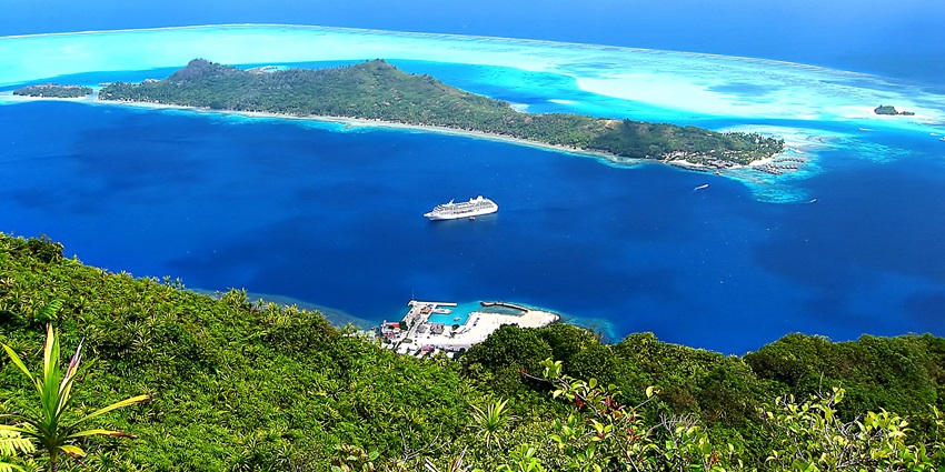 Aerial view of Bora Bora's lagoon, with Motu Toopua and Vaitape town visible.