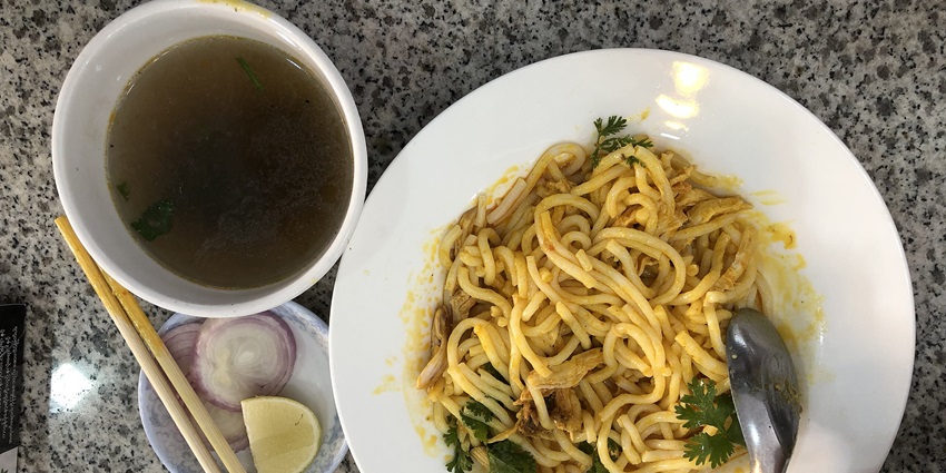 An image of Nan Gyi Thoke dish, a delicious noodle salad and one of the foods in Myanmar.