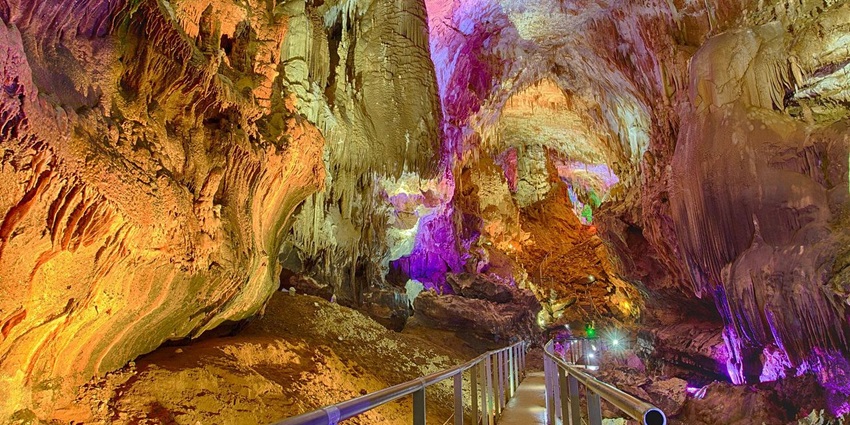 Explore stunning underground formations and lakes in this famous Georgian cave system.