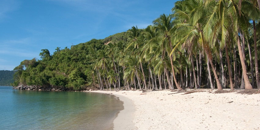 Relax at White Sand Beach, where soft shores and calm seas define tropical serenity