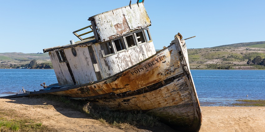 An old wrecked ship on an island that speaks a thousand words about itself and its history.