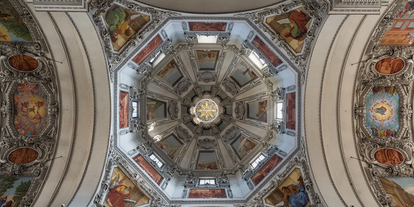 Interior view of the dome of Salzburg Cathedral in Austria, showcasing mesmerising design