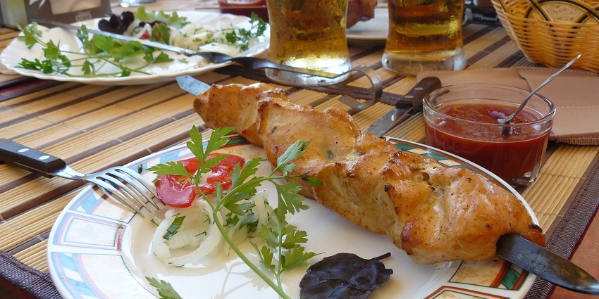 Image of a plate of grilled meat skewers, Shashlik, the best food in Russia.