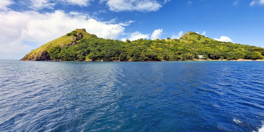 St. Lucia offers a refreshing escape amidst lush rainforests and volcanic beaches.