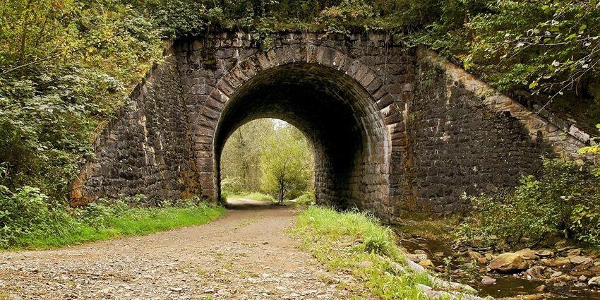Walk the historic Stone Bridge, a centuries-old link between cultures and city quarters.