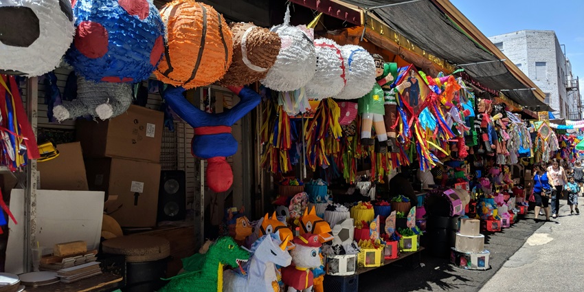 A group of people on shopping spree in the market of Pohnpei- Things to do in Pohnpei