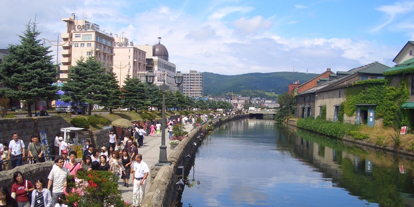 Tourists ready to take a boat ride in Otaru Canal, an adventurous thing to do in Hokkaido.