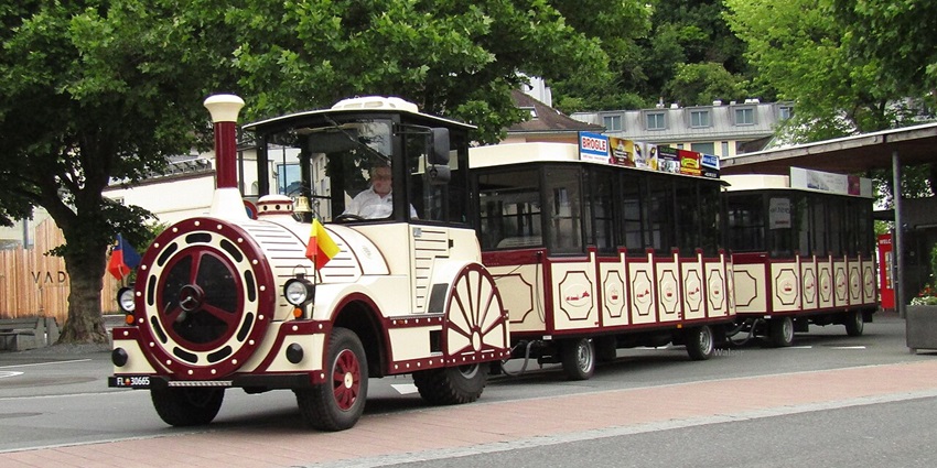 A classical style City Train Vaduz in Liechtenstein is on the tour of the city