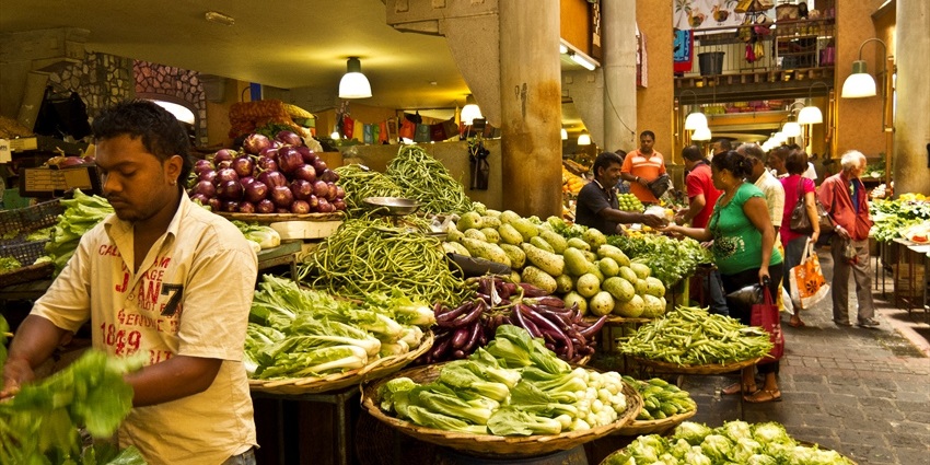 Food market in Port Louis, Mauritius, featuring vibrant stalls with fresh produce